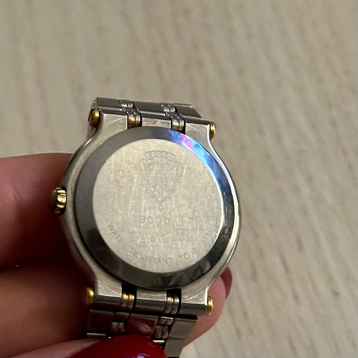 Gucci 26mm Dainty Two-Tone Gold Dial Date Watch