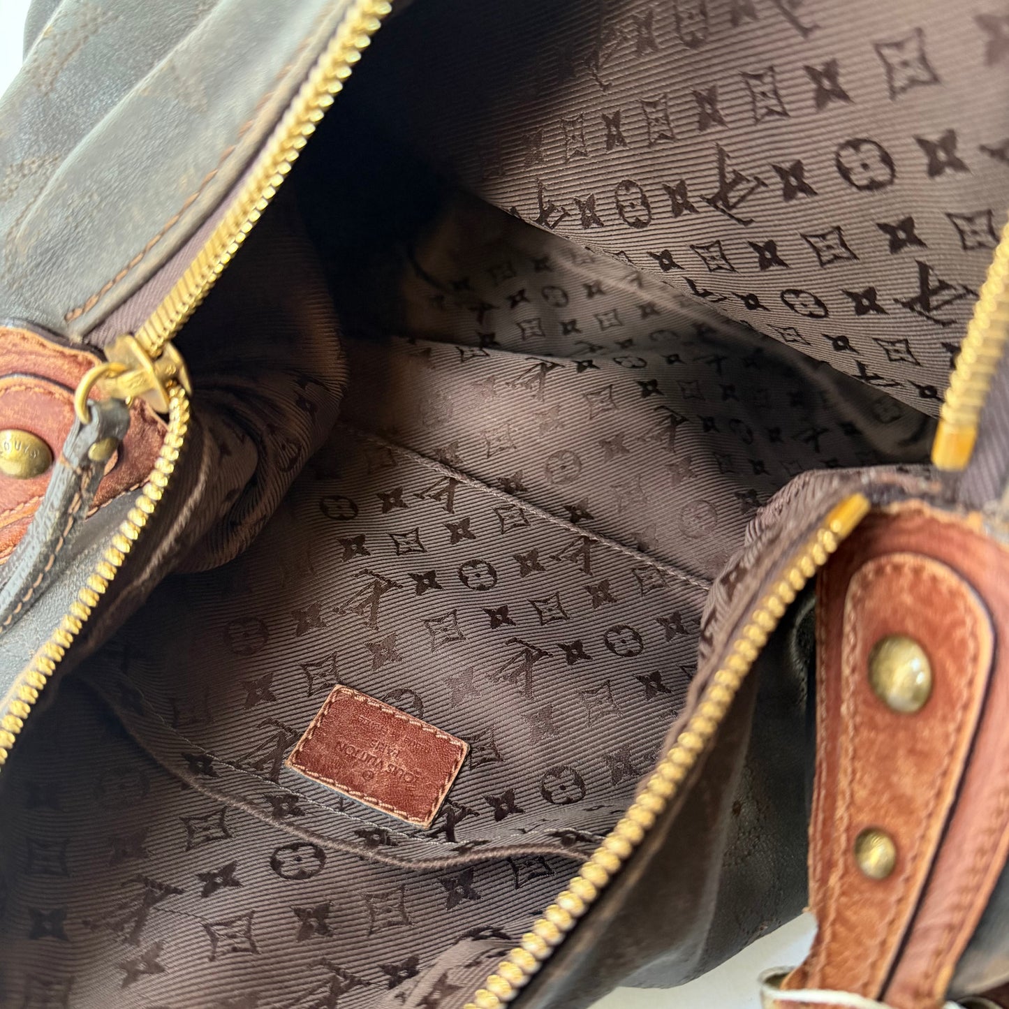 Louis Vuitton Brown Leather Monogram Perforated Mahina Onatah Hobo Bag