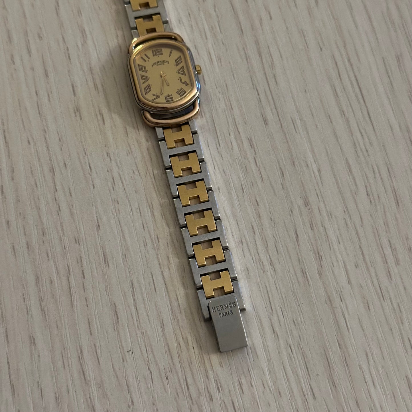Hermes Dainty Rallye Two-Tone Gold Dial Oval Tank Watch
