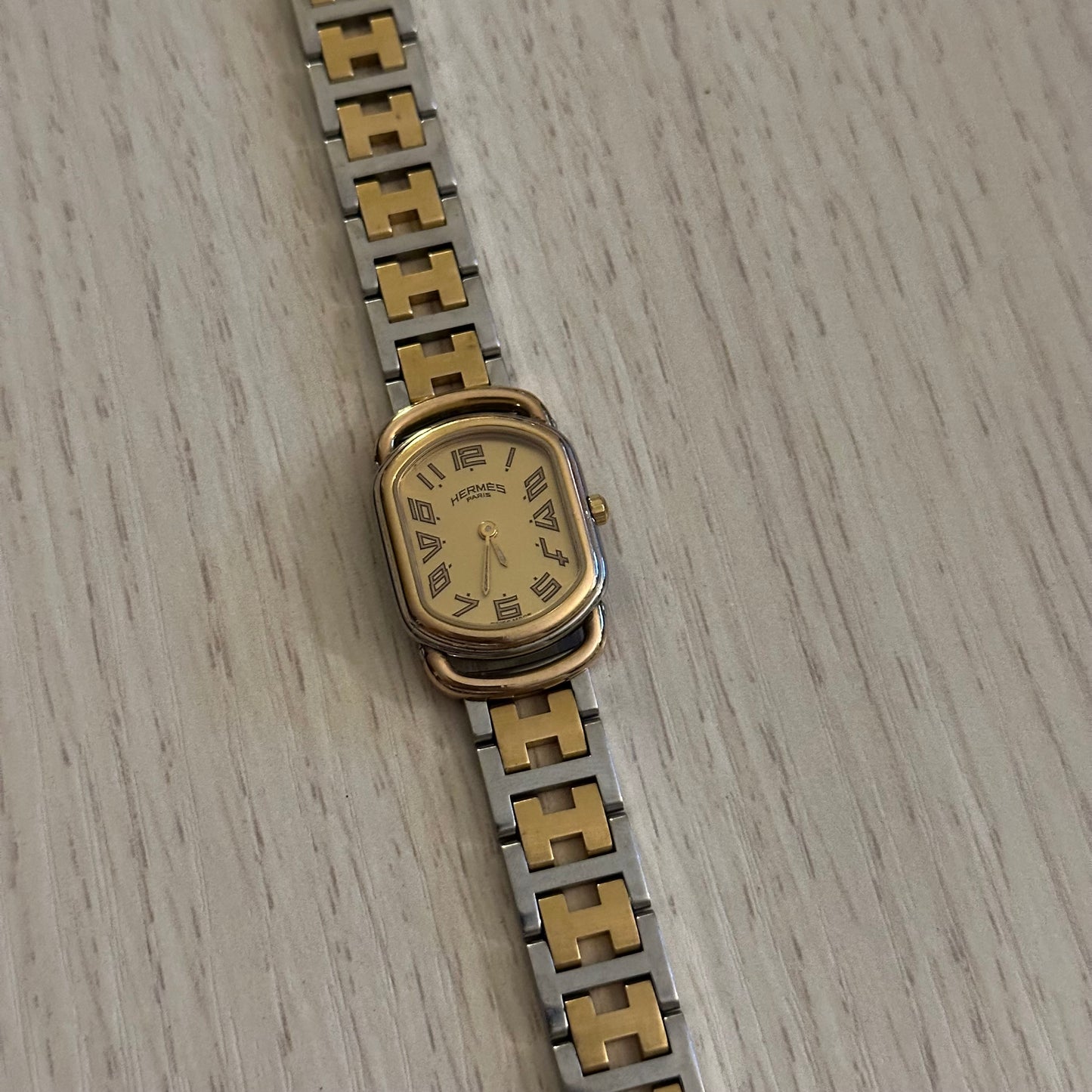 Hermes Dainty Rallye Two-Tone Gold Dial Oval Tank Watch