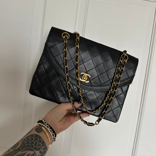 Chanel Black Round Mademoiselle Flap Bag Quilted Lambskin