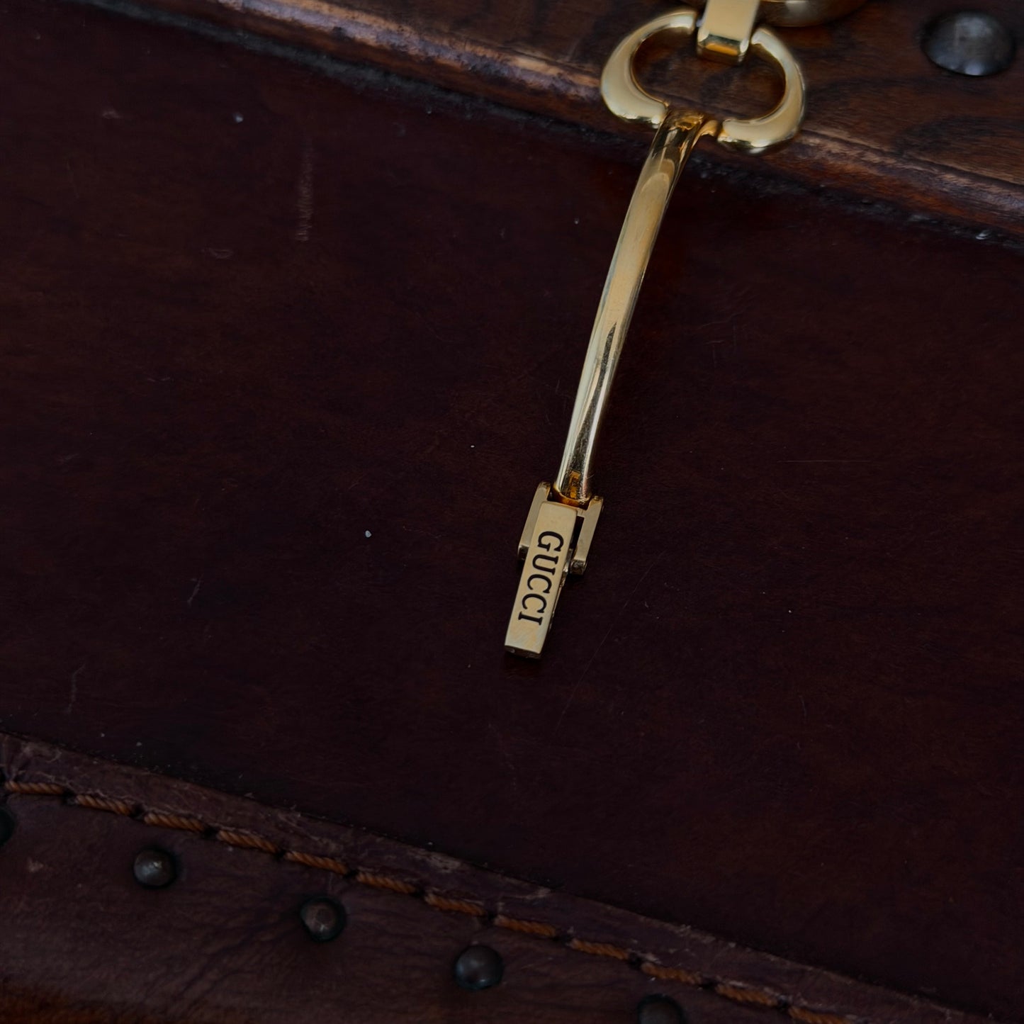 Gucci Gold Black Dial Horsebit Bangle Watch