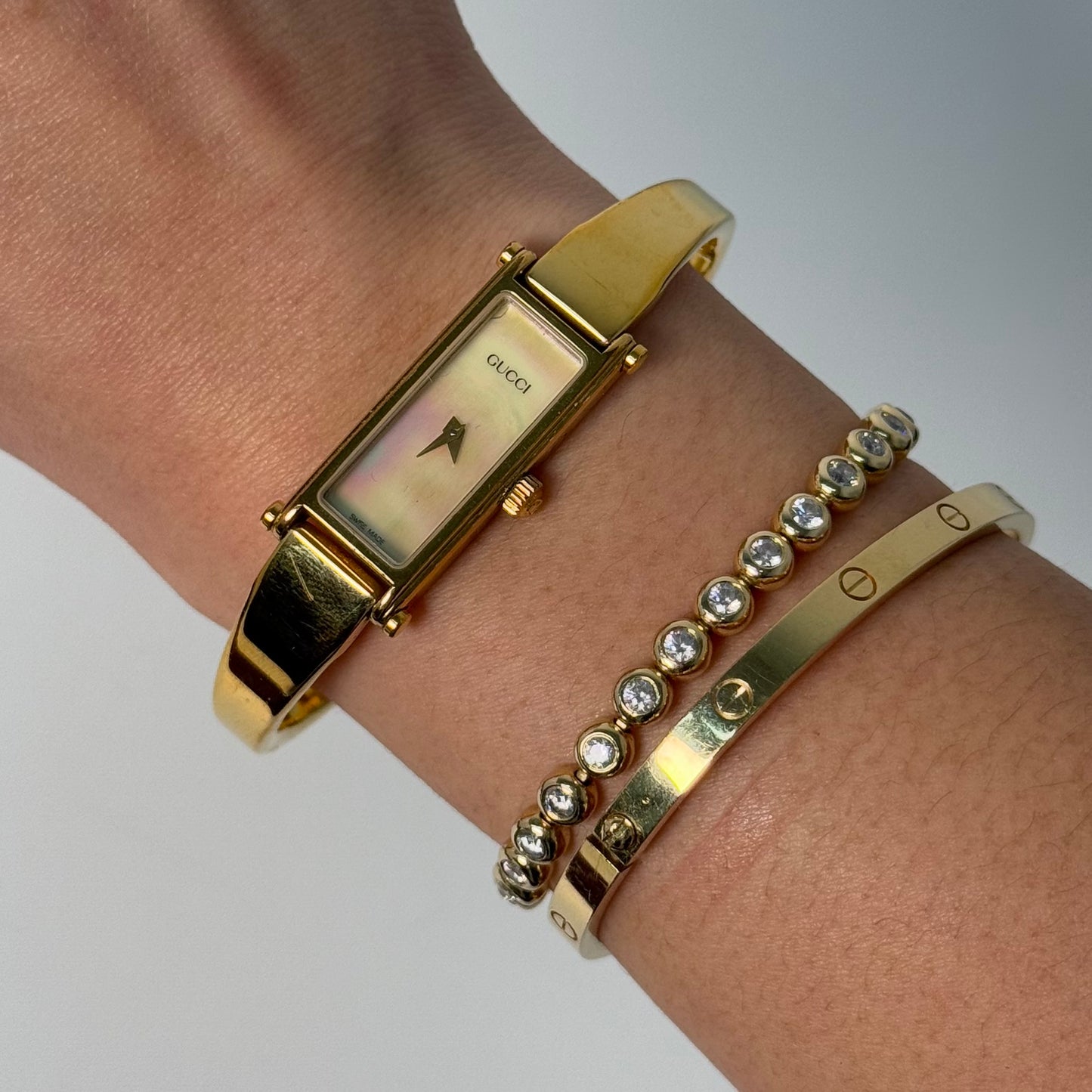 Gucci Gold Pearl Dial Horsebit Bangle Watch