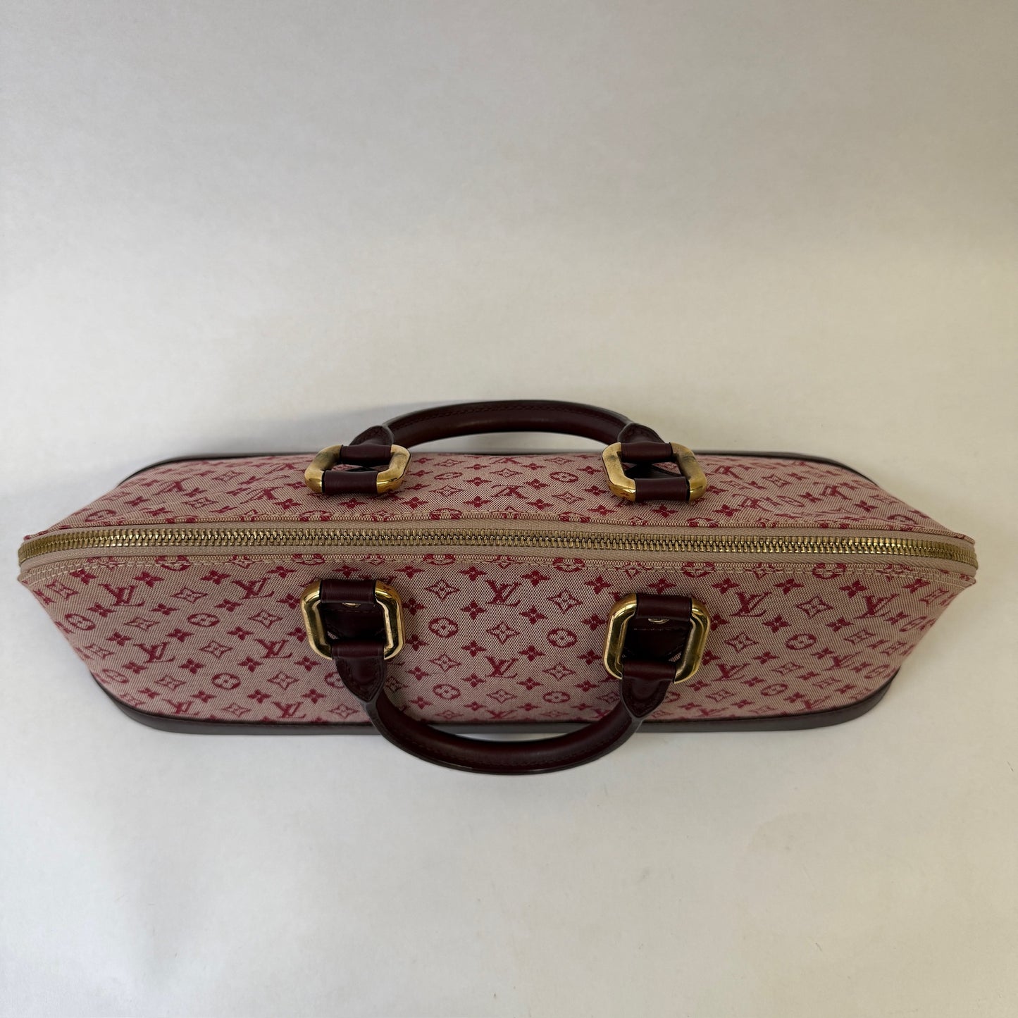 Louis Vuitton Red Monogram E/W Alma Minilin Monogram