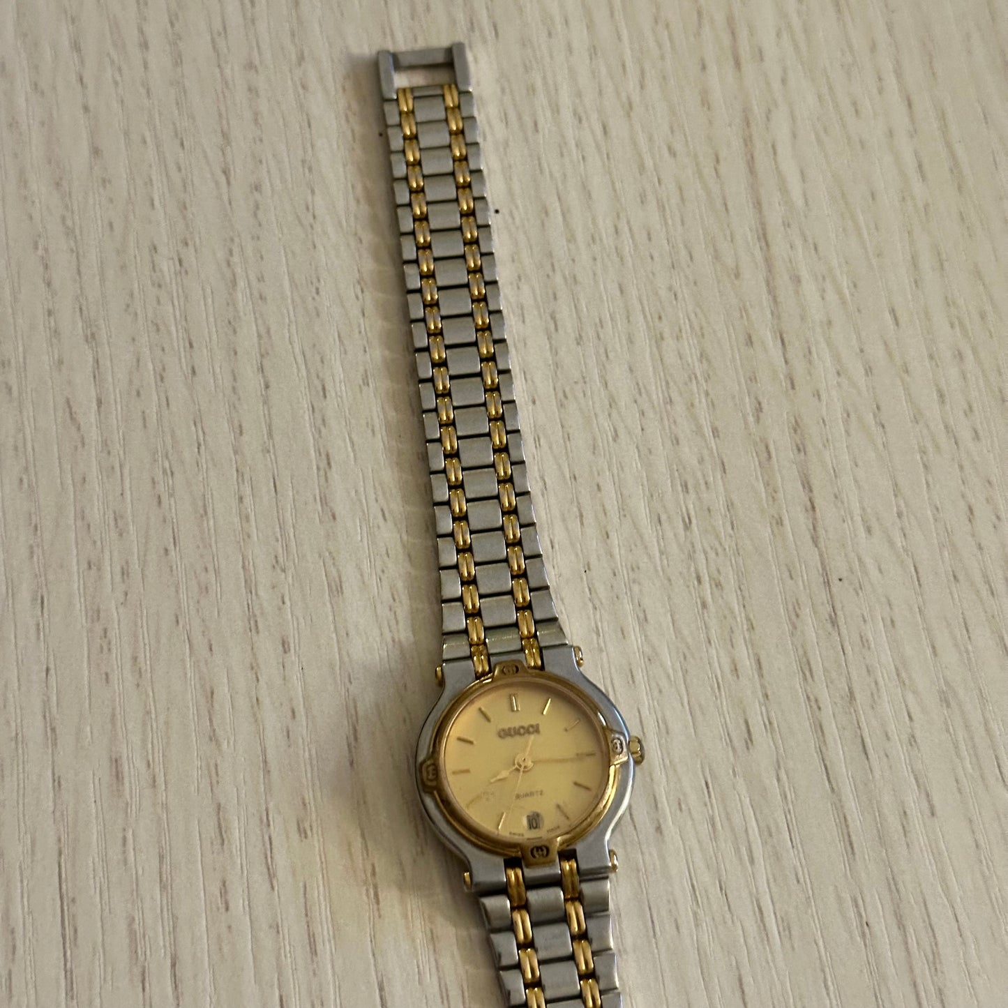 Gucci 26mm Dainty Two-Tone Gold Dial Date Watch