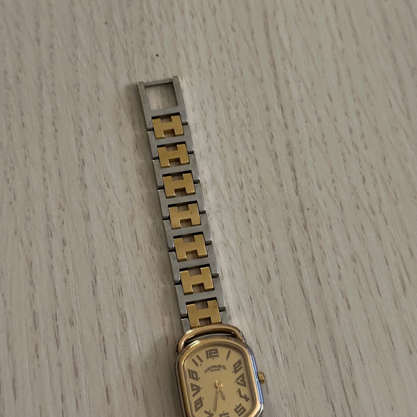 Hermes Dainty Rallye Two-Tone Gold Dial Oval Tank Watch