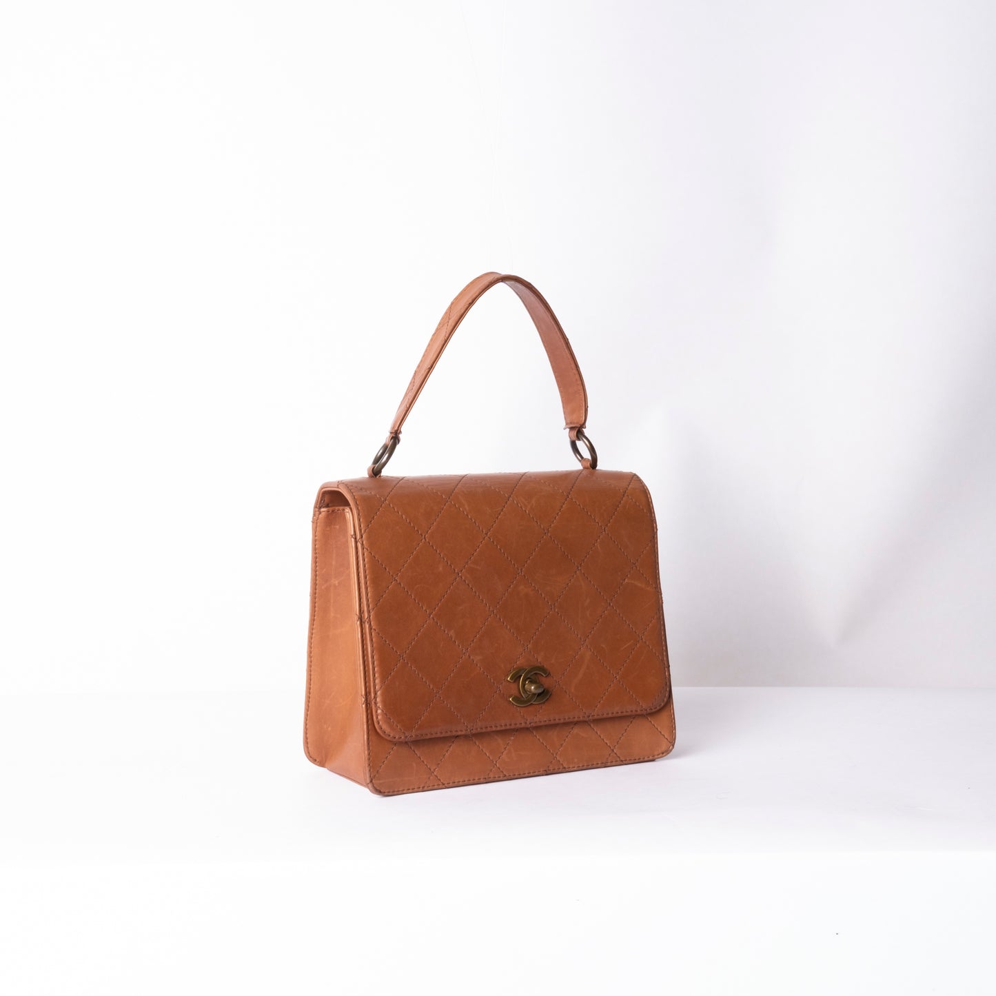 Chanel 1997 Brown Lambskin Leather Quilted Kelly Top Handle Flap